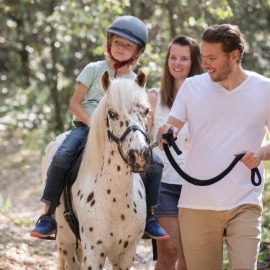 With the family: in the saddle for a horseback ride